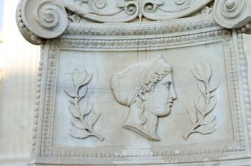 Athens academy pediment columns and statue 