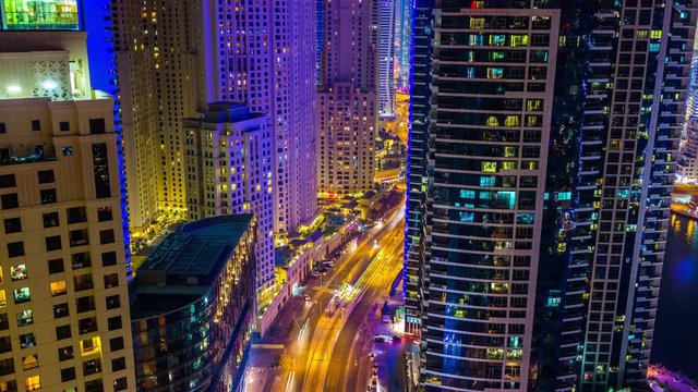 night dubai marina traffic road apartment buildings rooftop panorama 4k time lapse uae
