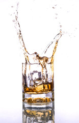 splash in whisky glass