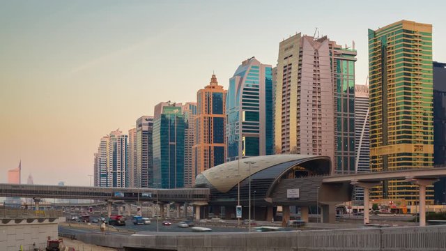 dubai marina sheikh zayed traffic road sunset jlt metro station panorama 4k time lapse uae
