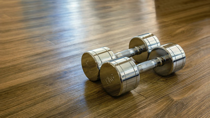 A Pair of Dumbells in a Sport Fitness Room