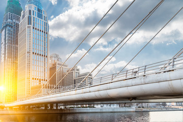 River And Modern Buildings Against Sky in Tianjin,China.