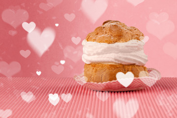 Delicious party cakes with heart shape symbols on colorful background