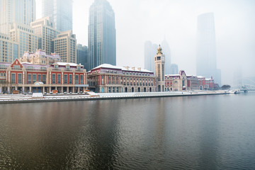 Obraz premium River And Modern Buildings Against Sky in Tianjin,China.