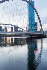 River And Modern Buildings Against Sky in Tianjin,China.