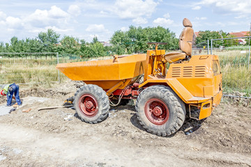 Fototapeta premium Small tipper, construction vehicle, container dumper