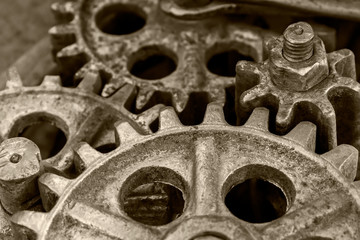 Fototapeta na wymiar rusty gears of old industrial mechanism, closeup