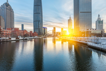 River And Modern Buildings Against Sky in Tianjin,China.