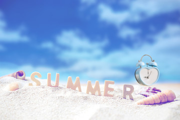 Summer holiday decoration with wooden text, retro clock and sea shall on white sand beach with tropical blue sea and cloudy sky,Image For Time to Love summer holiday vacation travel Concept.