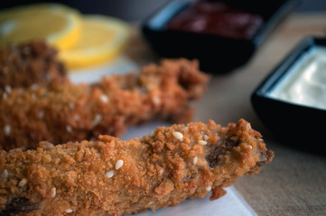 Crispy chicken fingers with french fries