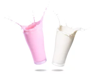 Papier Peint photo Milk-shake Milk and strawberry milk splashing out of glass., Isolated white background.