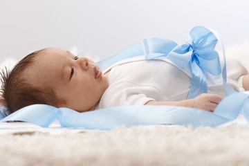 Side view of newborn baby
