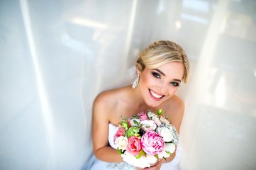 The bride with a beautiful smile.