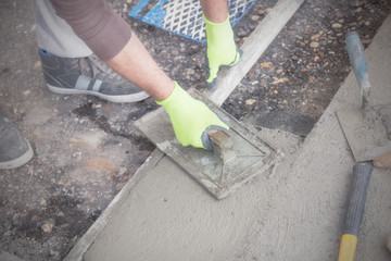 Renovating concrete pavement in home / budget DIY version.