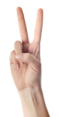 Hand showing the sign of victory and peace. Close up of female hand showing victory sign isolated on white background. Woman hand gesturing peace sign.