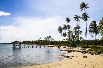 Secluded beach with clear skies