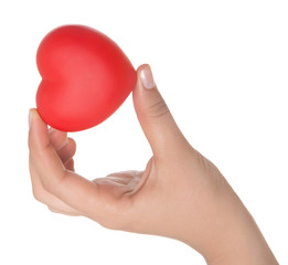 hands holding sweet little heart isolated on white background.