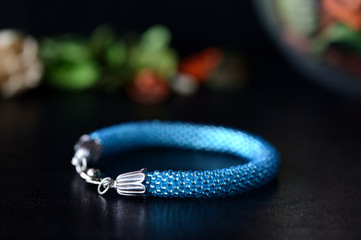 Turquoise beaded bracelet on a dark background