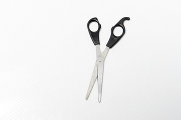 Scissors on white background with copy space