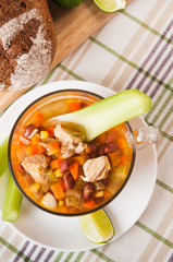 Mexican soup with chicken, celery and vegetables