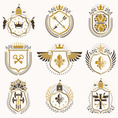 Set of vector vintage emblems created with decorative elements like crowns, stars, bird wings, armory and animals.  Collection of heraldic coat of arms.