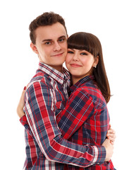 Teenage couple on white