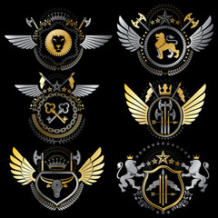 Obraz premium Collection of vector heraldic decorative coat of arms isolated on white and created using vintage design elements, monarch crowns, pentagonal stars, armory, wild animals.