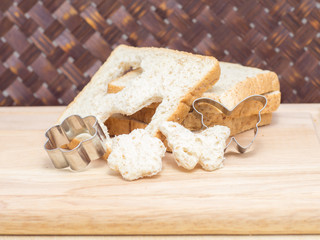 Bread and stainless mold on the cutting board