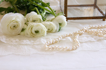 white delicate lace fabric and flowers