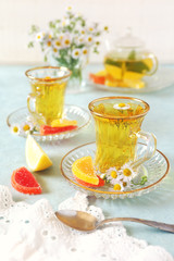 Obraz na płótnie Canvas Summer Tea Party: Herbal tea with fruit jelly. Toned image