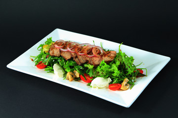 Delicious appetizer. Meat and vegatables.