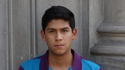 Obraz premium Serious Hispanic Teen Boy