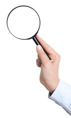 Female hand holding the magnifying glass isolated on white background