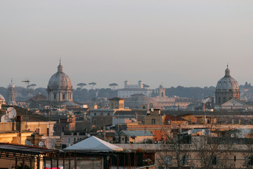 Fototapeta na wymiar Dome and roofs of Rome