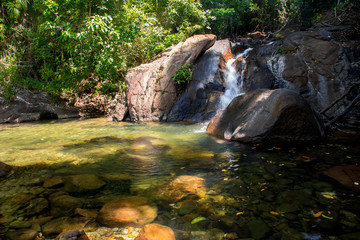 Naklejka na ściany i meble Green and clean waterfall , Thailand