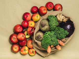 Organic vegetables and fruits on a craft paper background