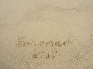 Summer 2017 written on sand