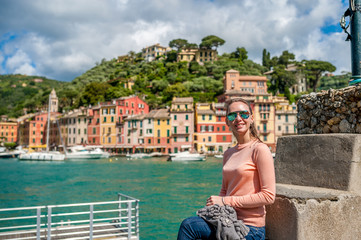 Fototapeta na wymiar Woman at Portofino village on Ligurian coast, Italy