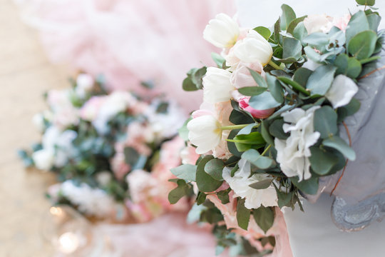 Flowers. Decoration of wedding table in ivory colors