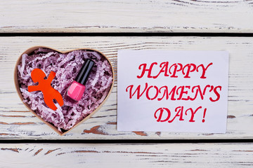 Nail polish, card and box. Women's day wish.