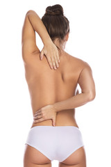 Naklejka premium Woman with pain in her back