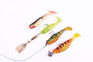 Fishing silicone bait fish on a white background. Fishing items for fisherman
