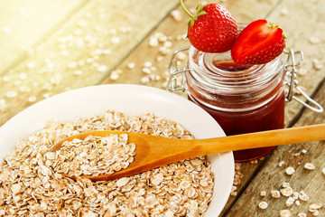 Oatmeal flakes with strawberry jam