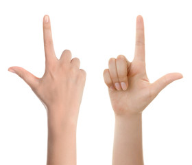 Woman hand pointing up with index finger or touching screen back hand side isolated on white background.