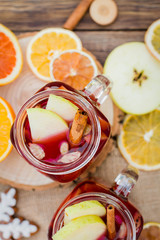 Hot wine on a wooden table