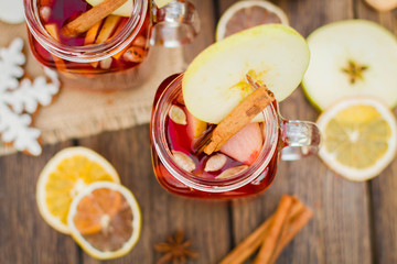 Hot wine on a wooden table
