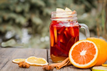 Hot wine on a wooden table