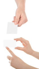 Obraz premium Woman hand hold virtual business card, credit card or blank paper isolated on white background.Clipping path included