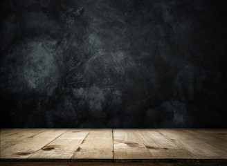 Empty wooden table over grunge wall Empty ready for your product display or montage.