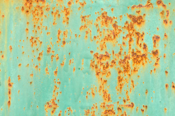 background rusty metal on the painted surface of the green
